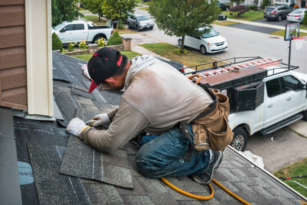 Professional Roofing technician working in Wellston, MI
